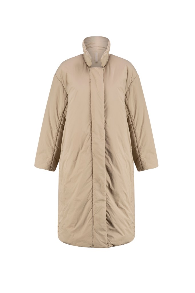 A cream lululemon ThermoZen Insulated Mac Coat on a white background.